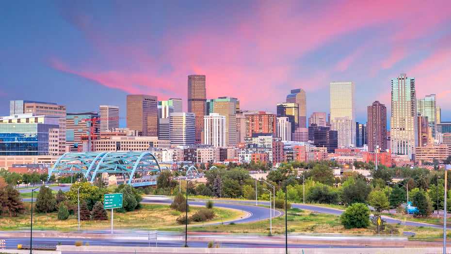 Panorama of Denver skyline at twilight.